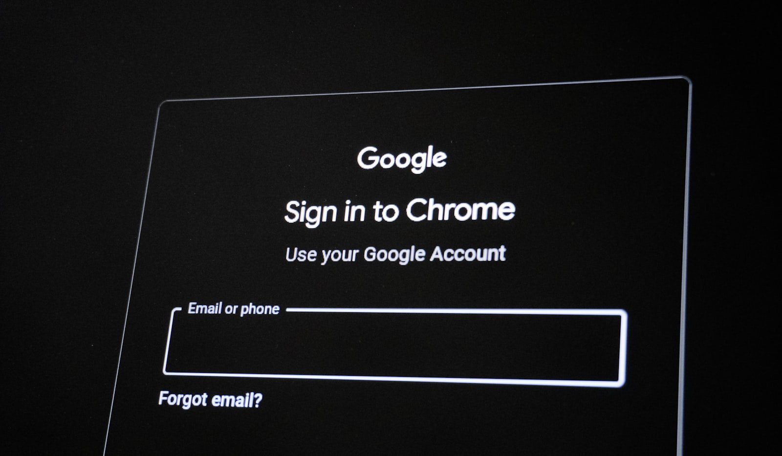 A laptop screen displaying a browser sign in page with username and password fields